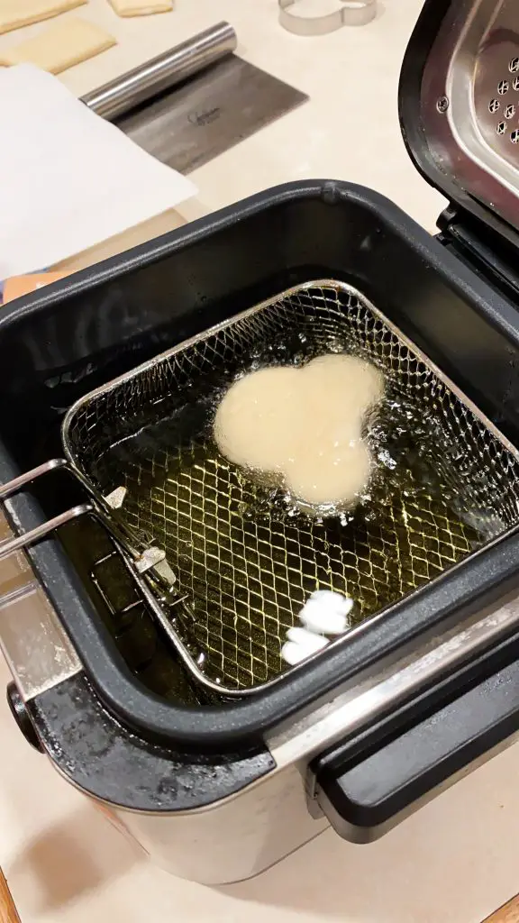 frying a beignet