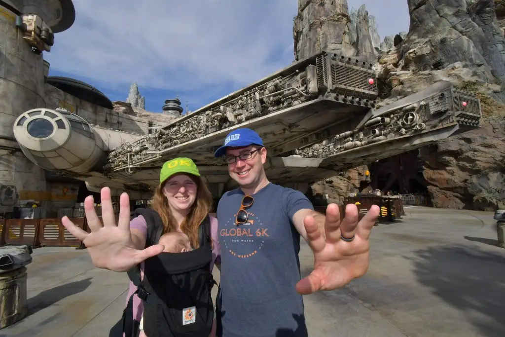 forrest, katie and baby in front of galaxy's edge