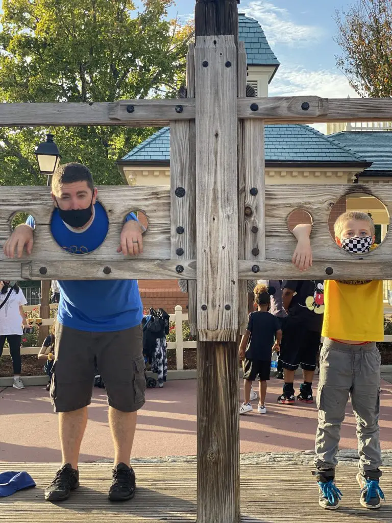 father and son in disneyland 