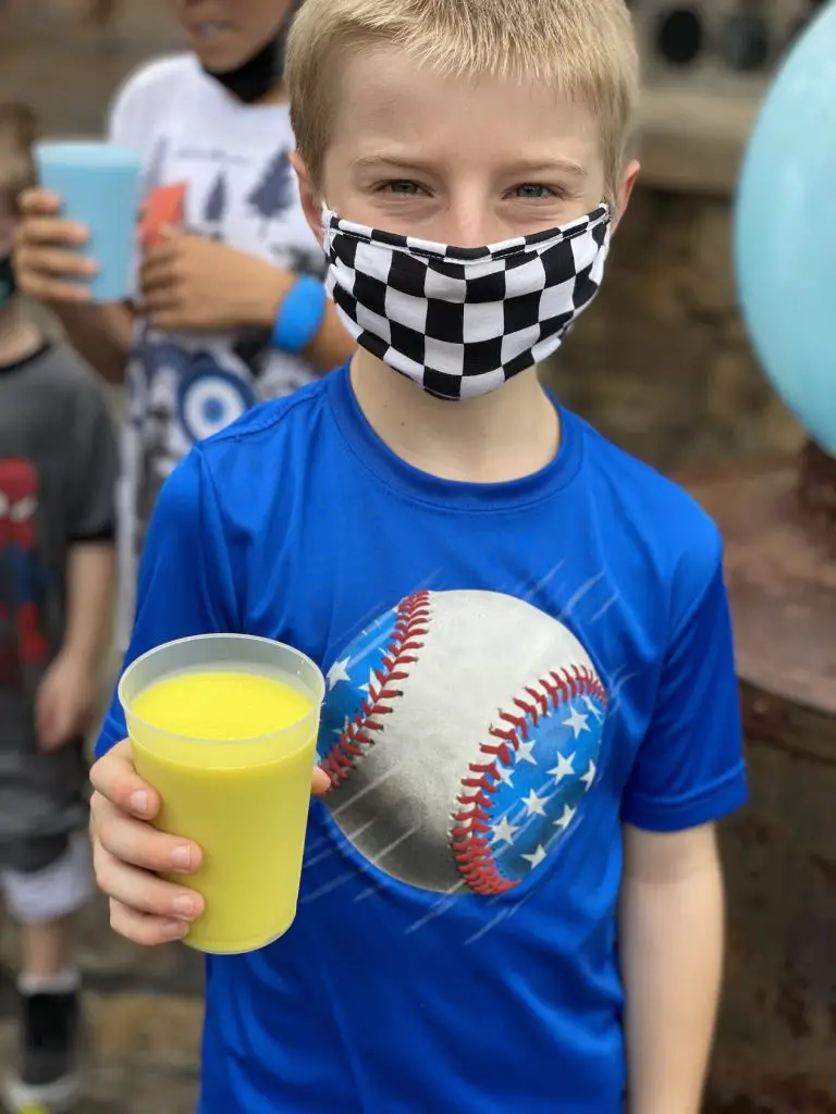 boy at disney with a mask on