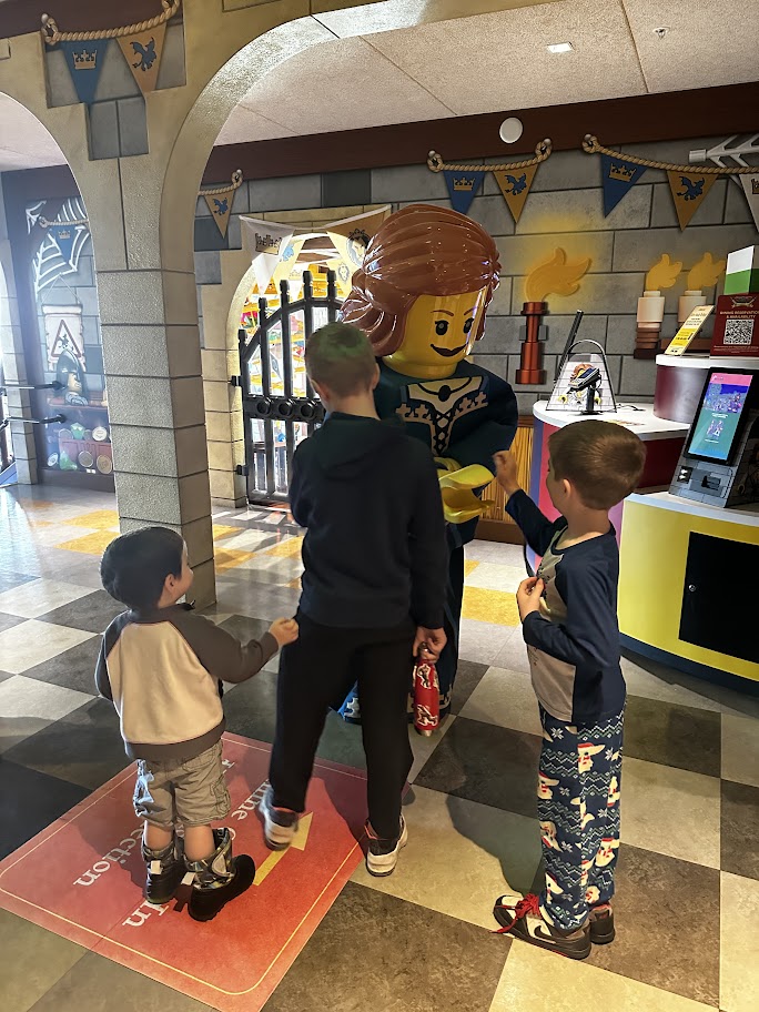 kids meeting lego character at legoland